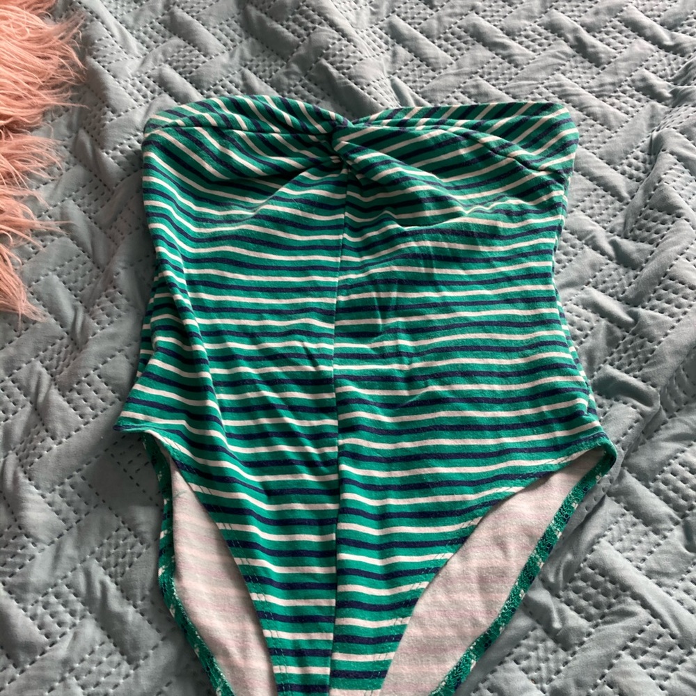 green bodysuit